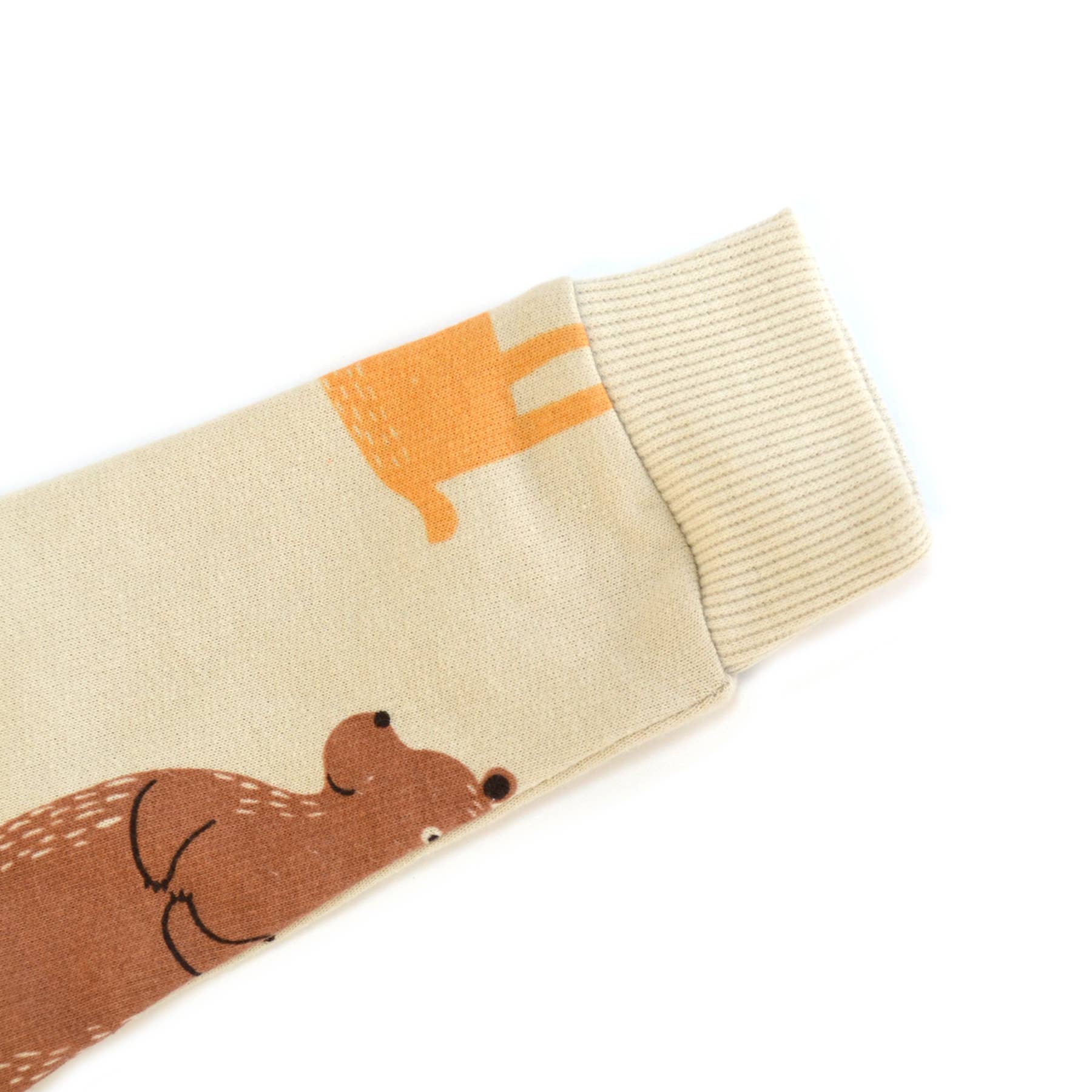 Beige sock with brown bear design on a white background