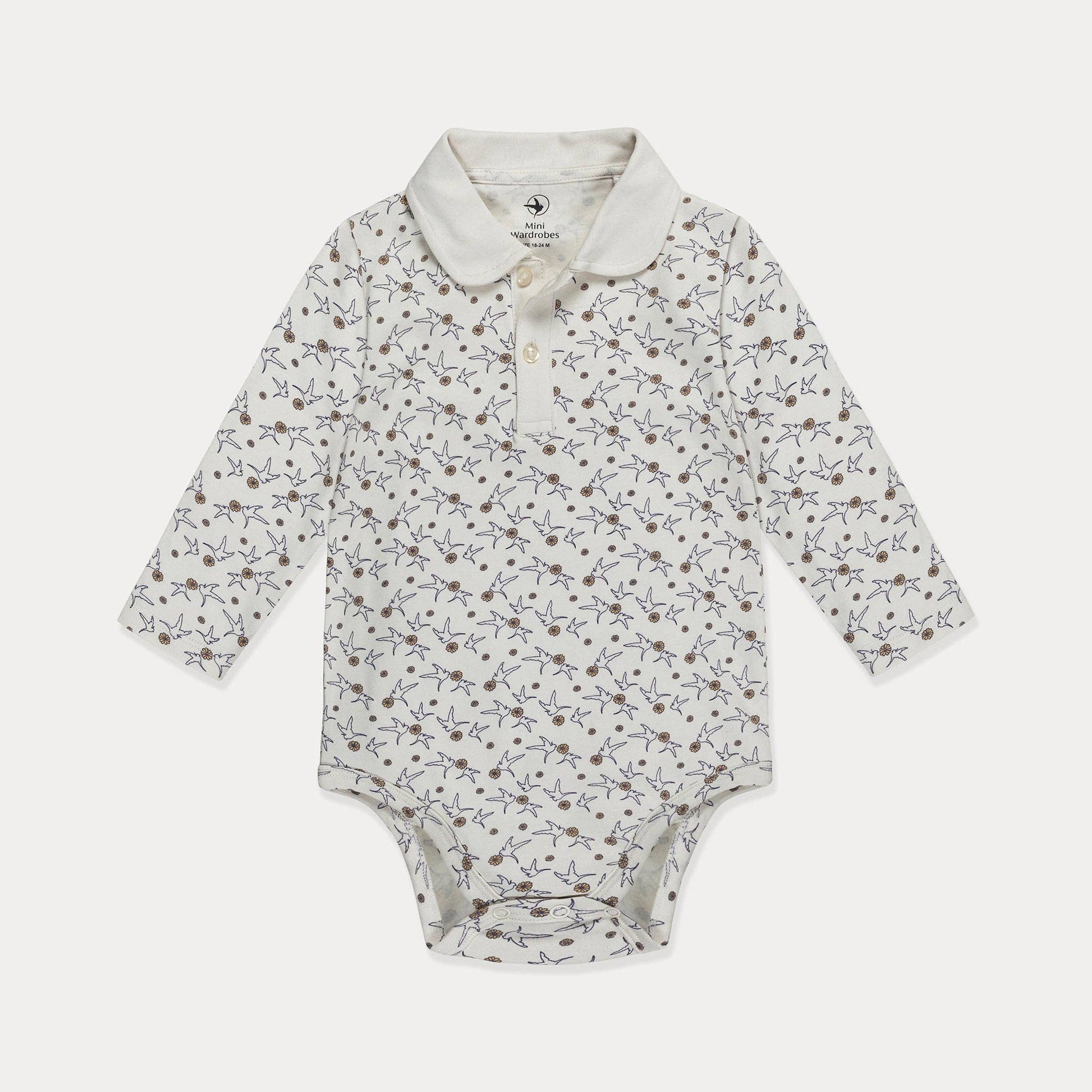 Baby bodysuit with floral pattern on a white background