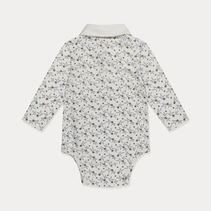 Baby onesie with a floral pattern on a white background