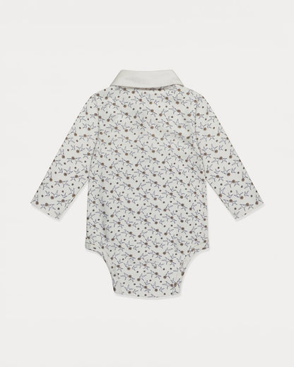 Baby onesie with a floral pattern on a white background