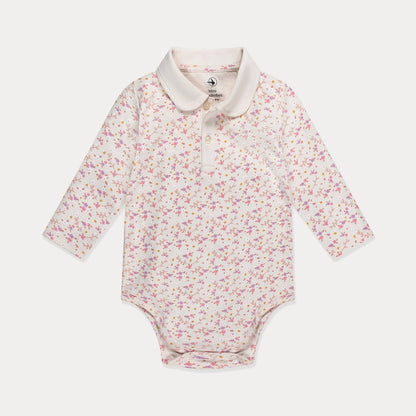 Floral-patterned baby bodysuit with a white collar on a light gray background