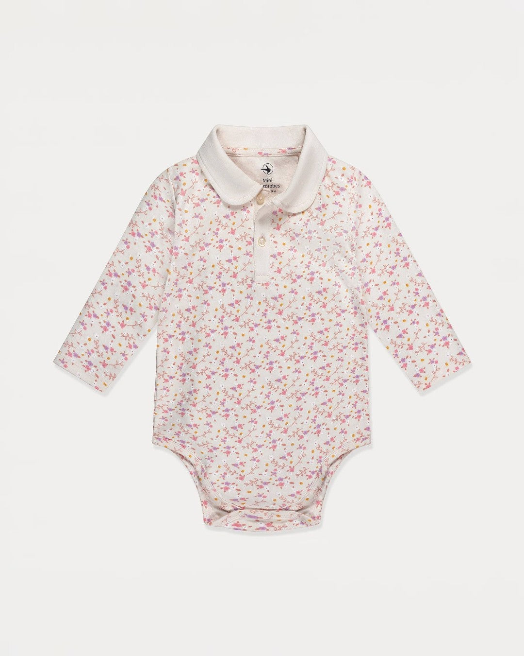 Floral-patterned baby bodysuit with a white collar on a light gray background