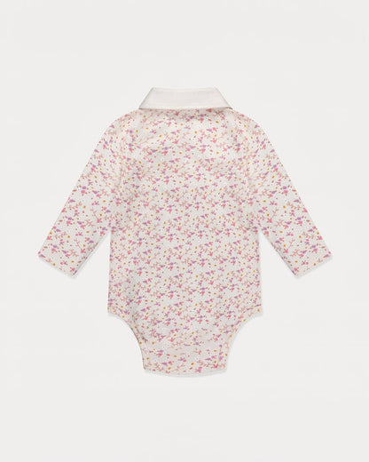 Floral-patterned baby onesie on a white background