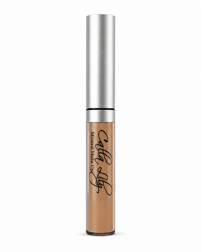 Cosmetic concealer with silver applicator on a white background