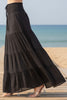 Black tiered maxi skirt on a white background
