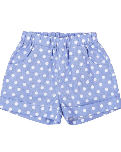 Blue shorts with white polka dots on a white background