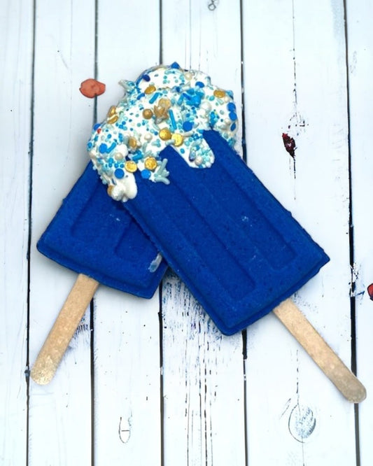 Two popsicle bath bomb - Blue  against a wooden background