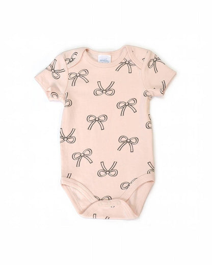 Baby onesie with bow pattern on a white background