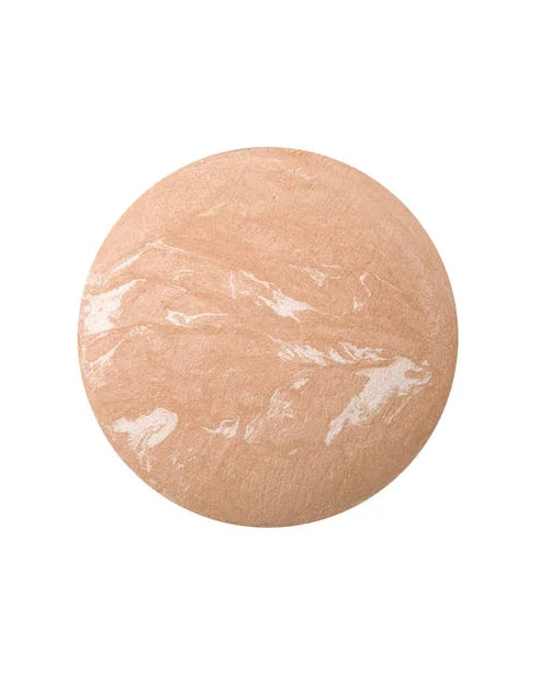 Round beige fabric patch on a white background