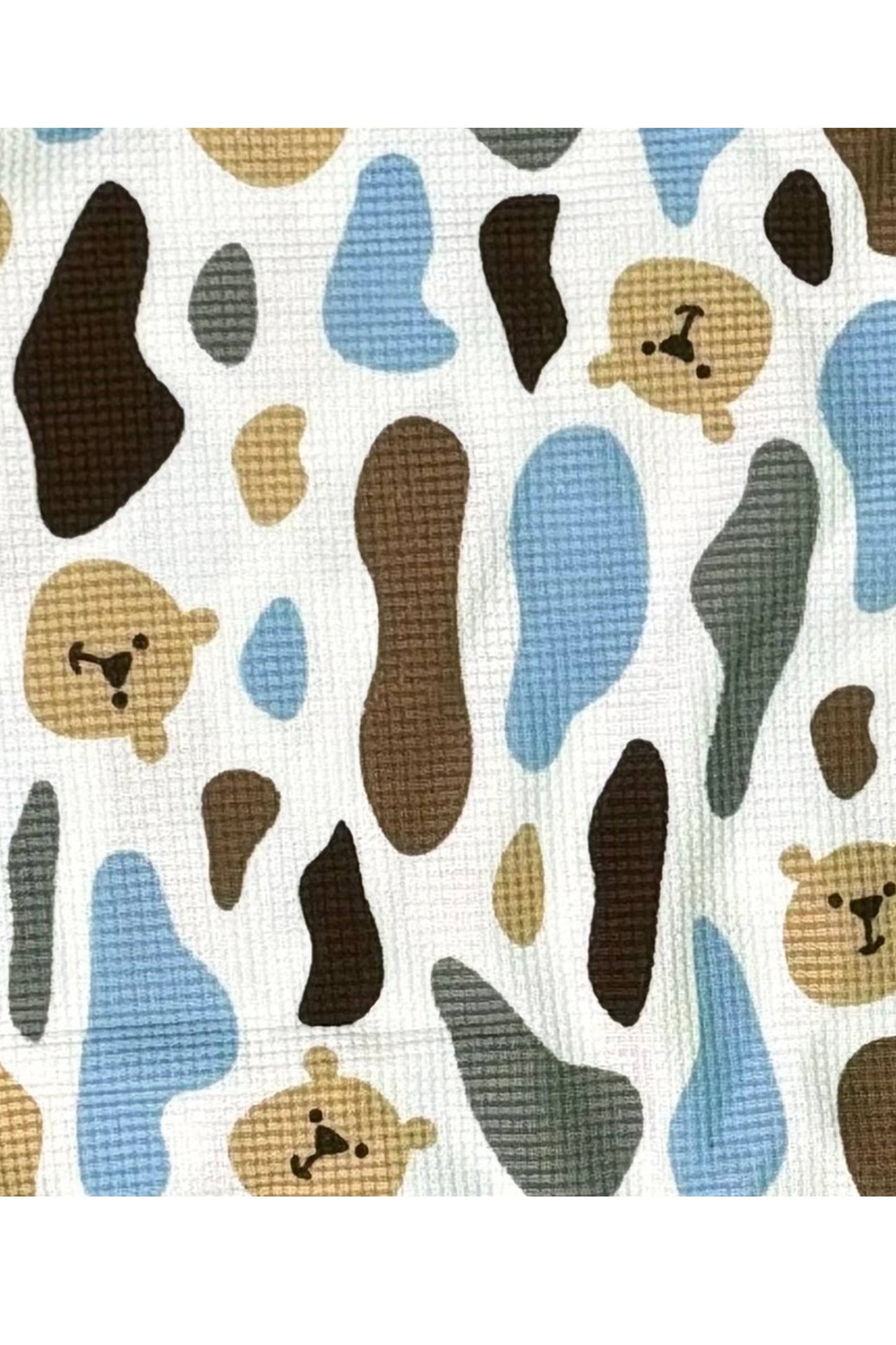 Patterned fabric with bear and cloud shapes on a white background