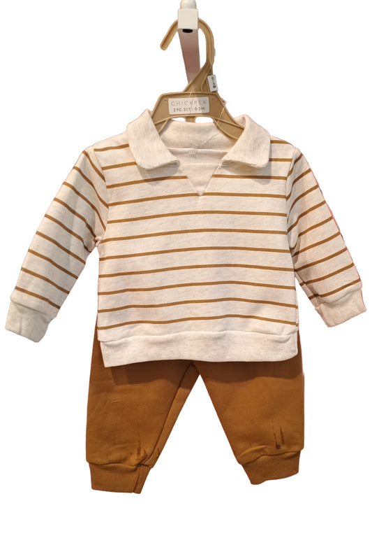 Striped shirt and brown pants against a white background