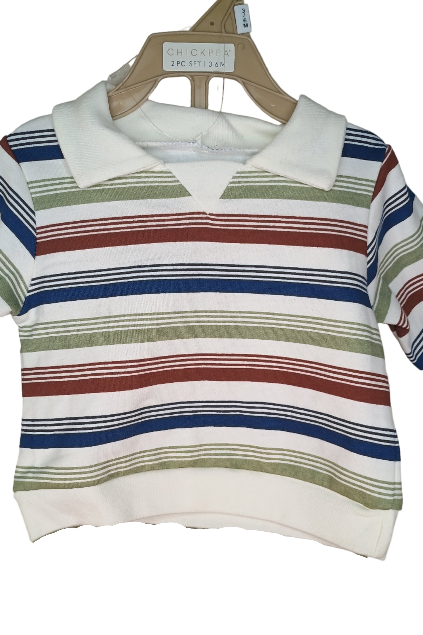 Striped shirt with multicolor pattern on a white surface