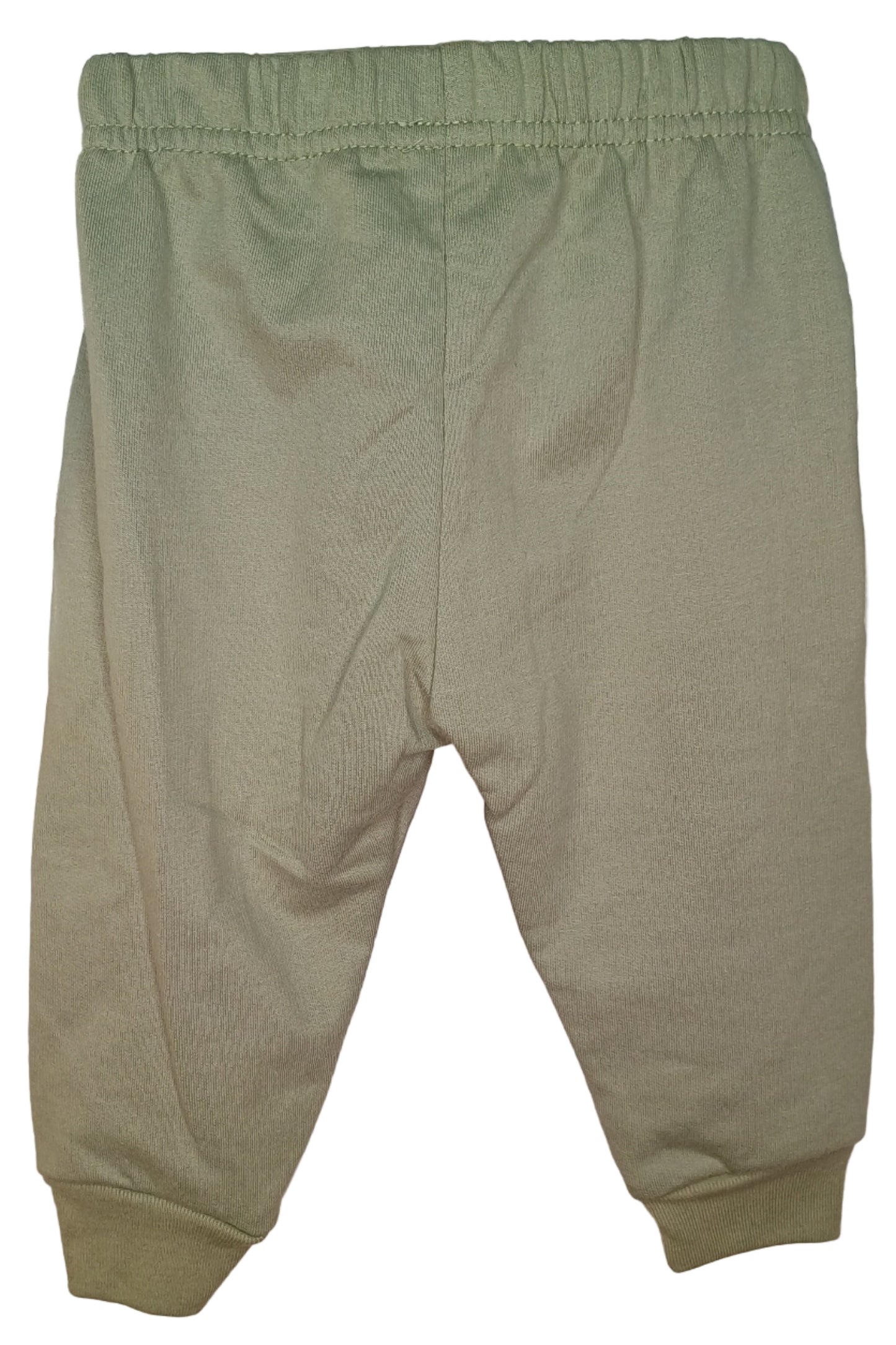 Green pants on a white surface
