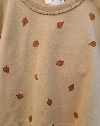 Baby shirt in tan with acorns on it