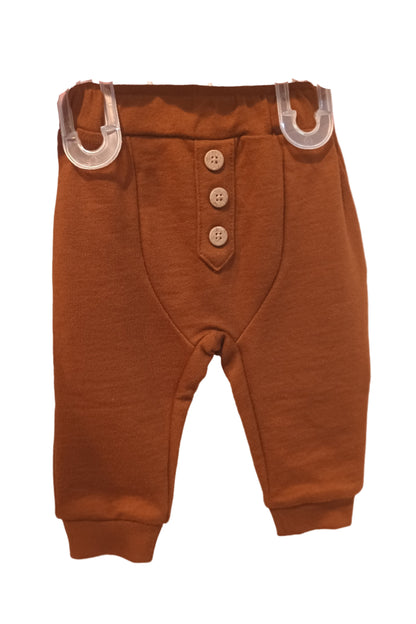 Brown children's pants with buttons on a white background