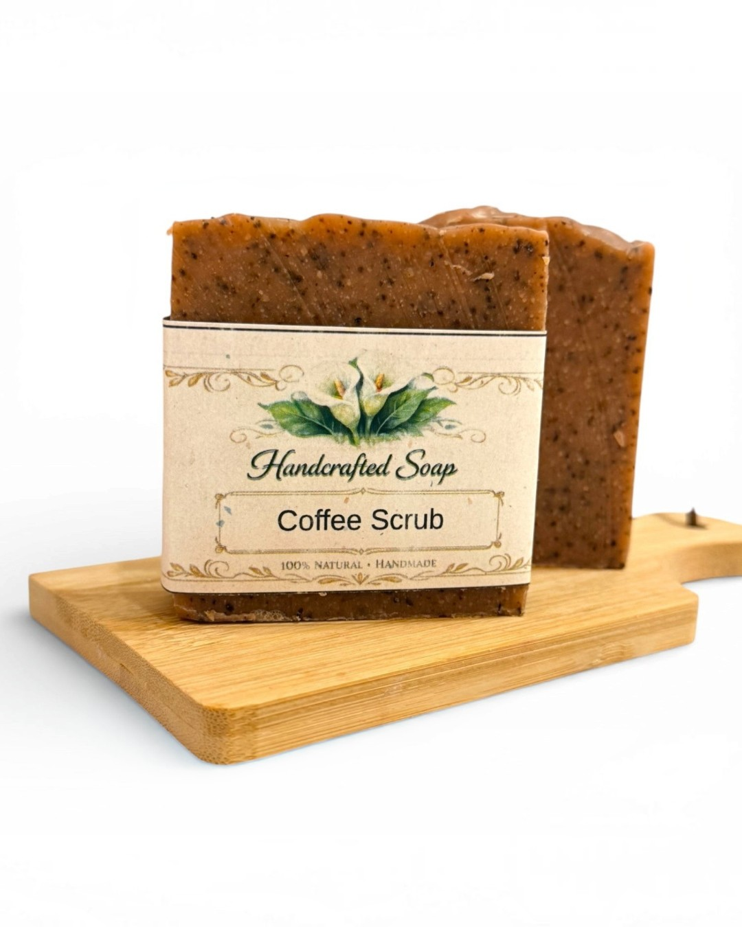 Handcrafted Coffee Scrub soap on a wooden tray with a white background