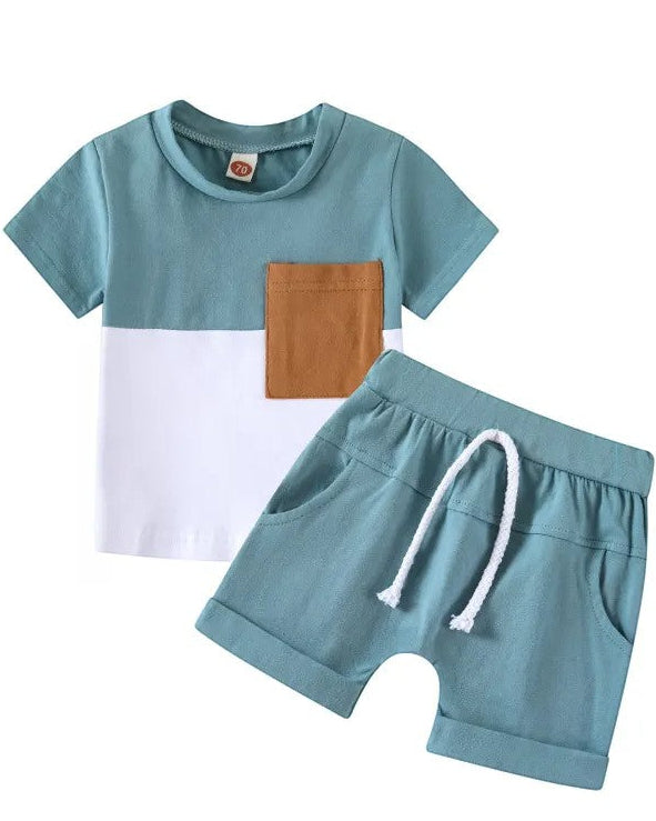 Children's outfit with a blue and white shirt and shorts on a white background