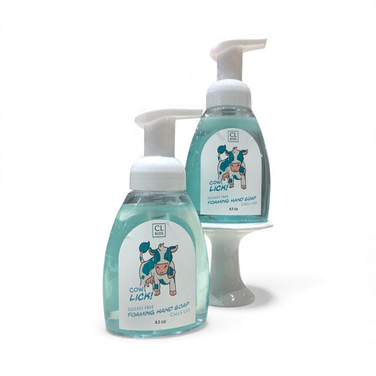 Two bottles of CL Kids Cow Lick hand soap on a white background