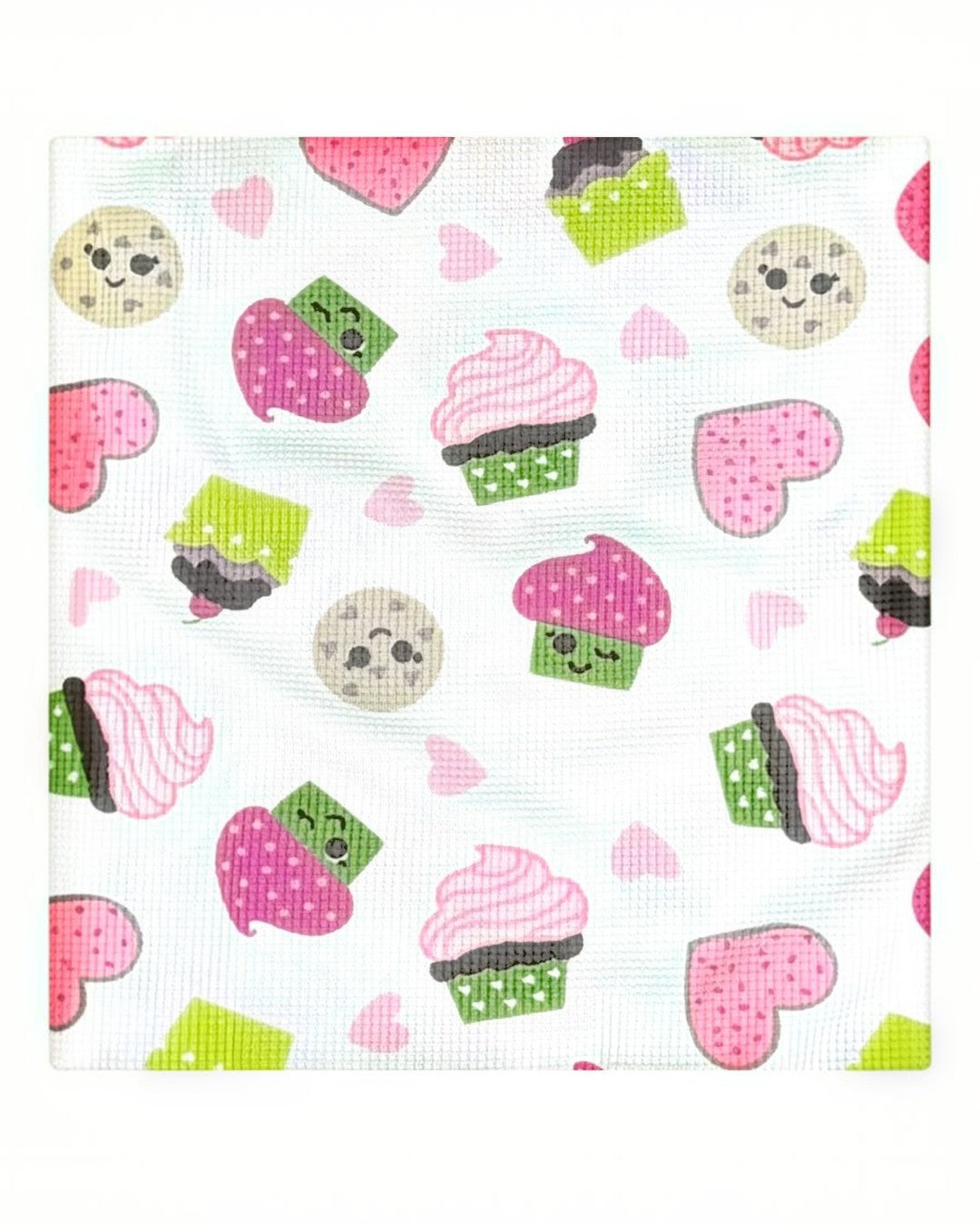 Pattern of colorful cupcakes and cookies on a white background