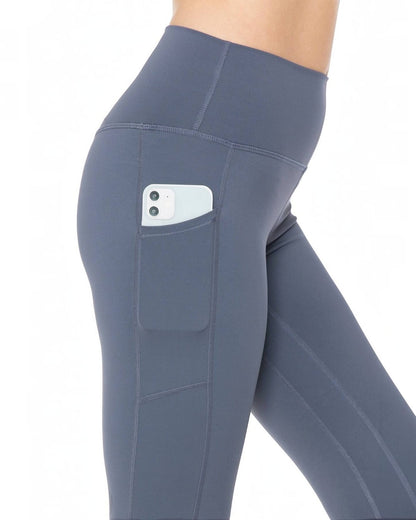 Gray leggings with a pocket on a white background