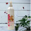 A white pump bottle of our bunny tracks body lotion