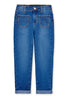 Blue jeans with studded details on a white background