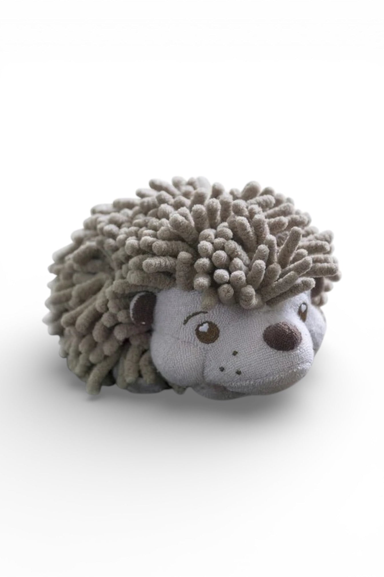 Plush toy hedgehog on a white background