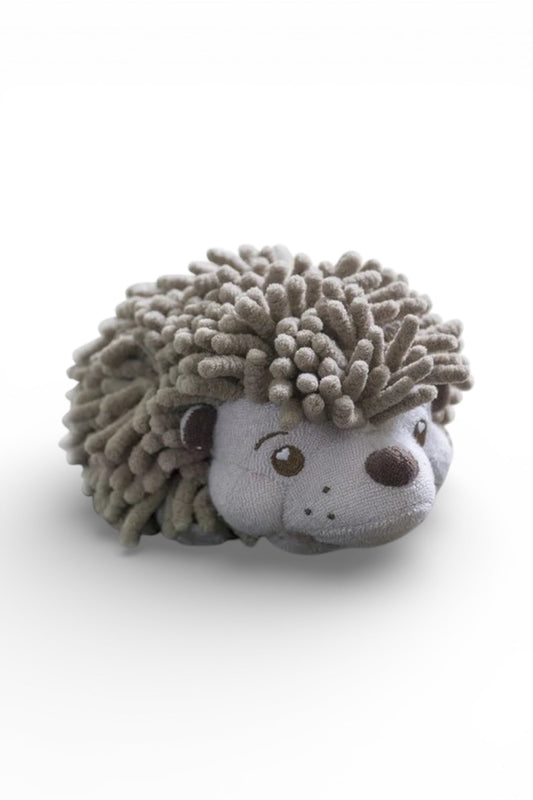Plush toy hedgehog on a white background