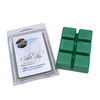 Green wax melts in a packaging on a marble surface