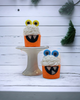 Calla Lily Cosmetics + CL kids orange monster bath bombs shaped like cupcakes with bubble icing and googly eyes.