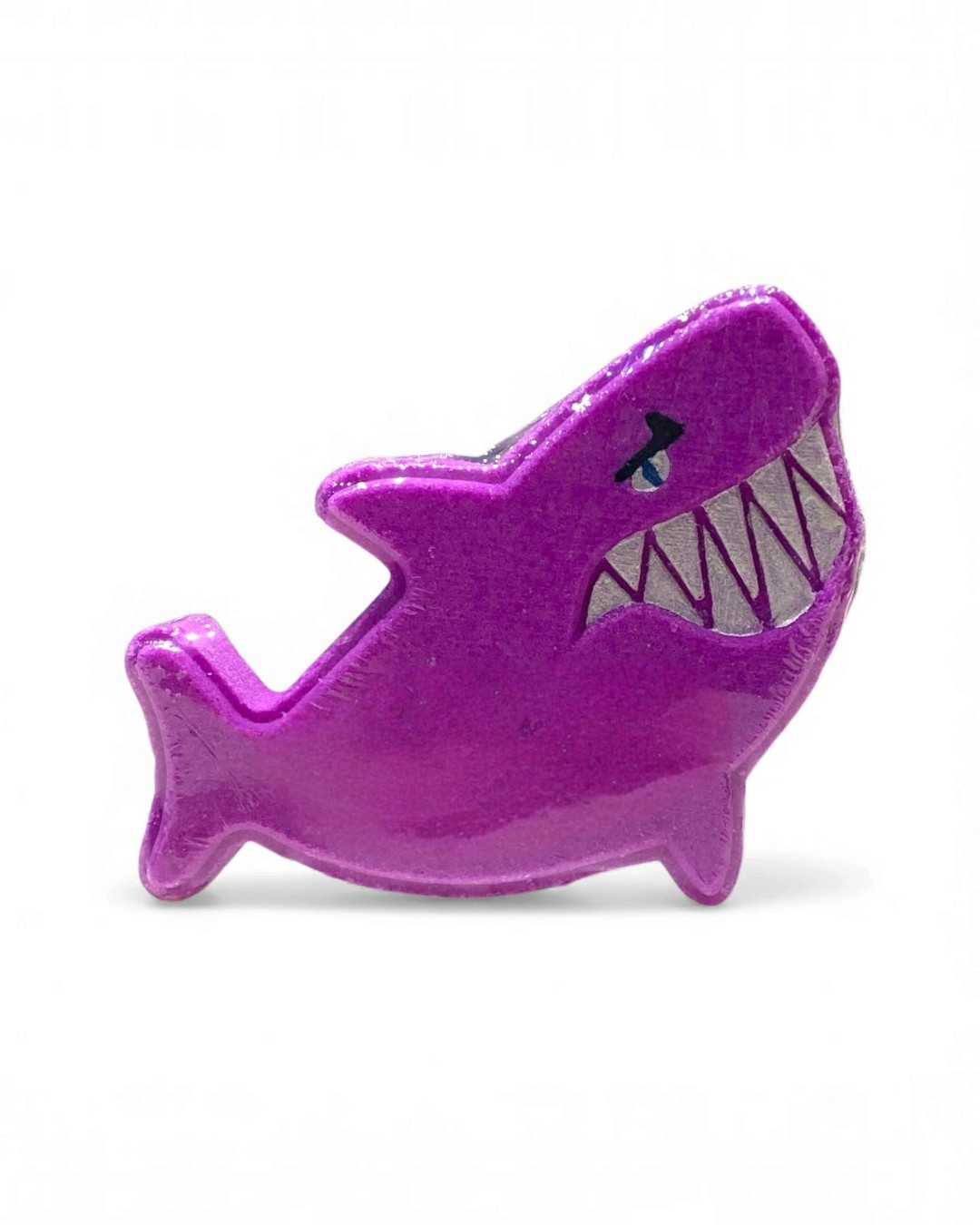 Calla Lily Cosmetics + CL kids purple shark-shaped bath bomb with a grape soda scent for kids