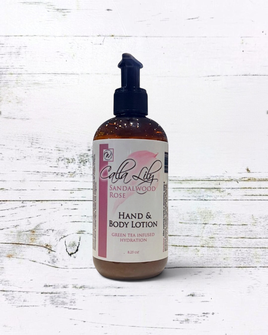 Calla Lily Cosmetics + CL kids Sandalwood Rose hand and body lotion in an amber pump bottle on a soft pink background.