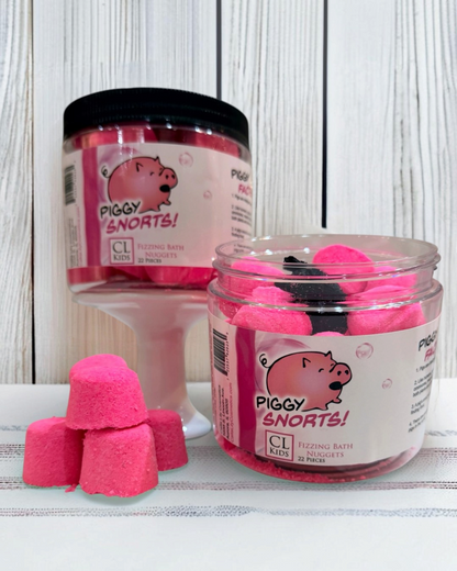Calla Lily Cosmetics + CL kids Piggy Snorts strawberry scented pink bath nuggets in clear jars with pig branding