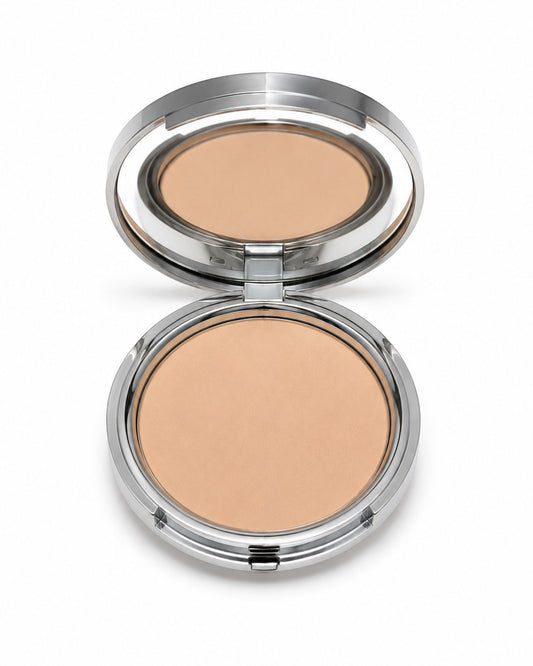 Compact powder in a silver case on a white background