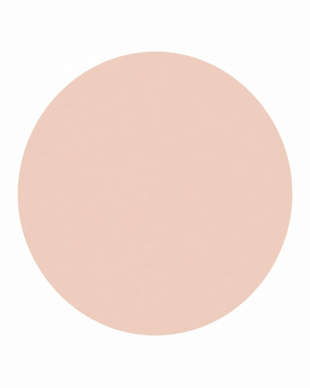 Beige circular patch on a white background