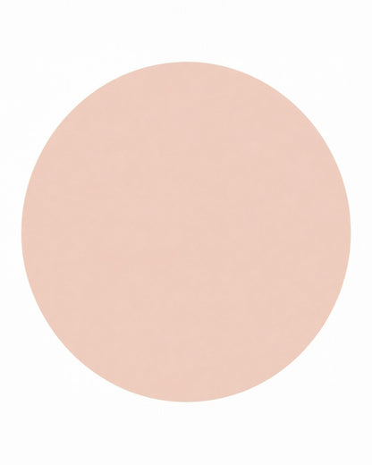 Beige circular patch on a white background