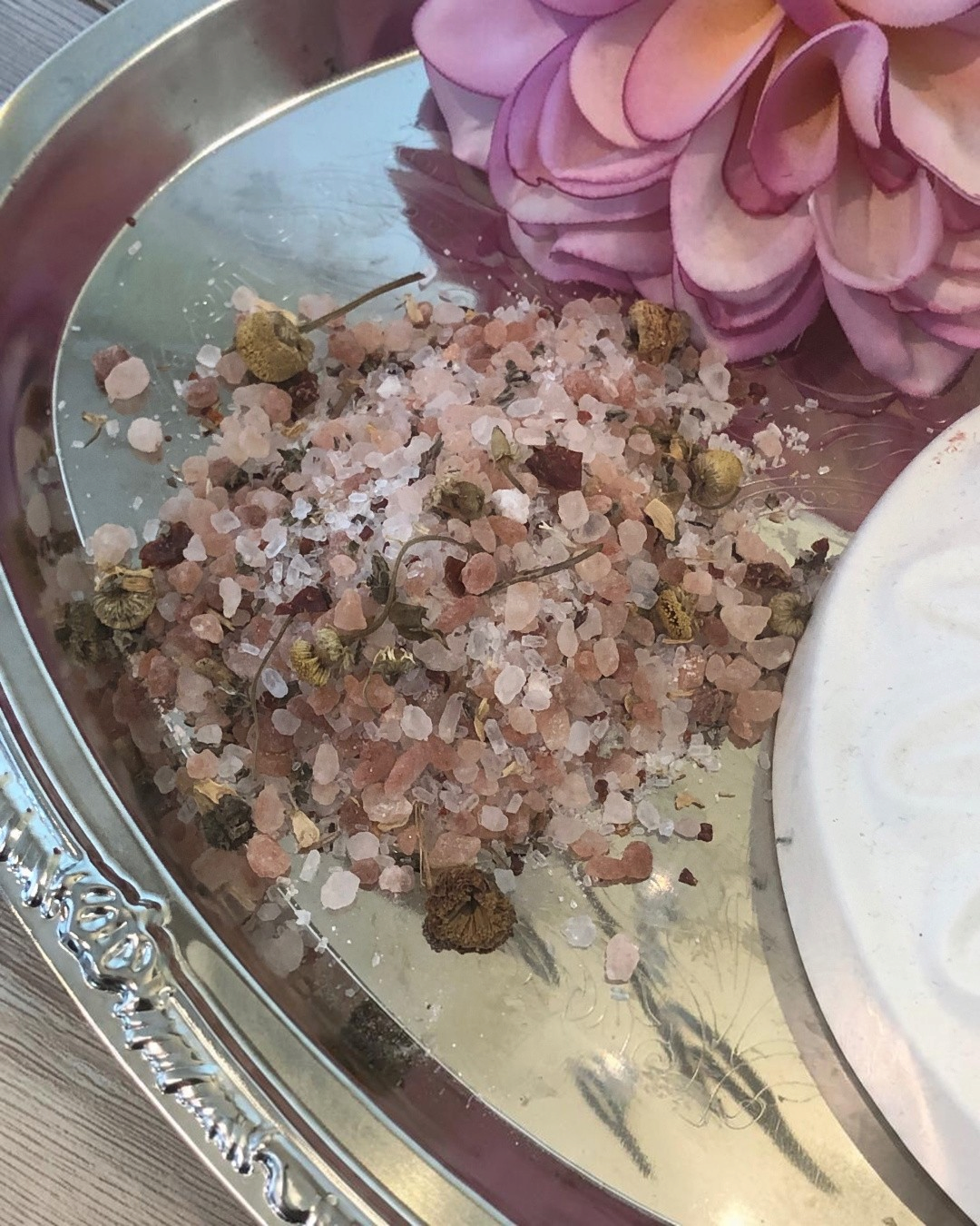 Calla Lily Cosmetics + CL kids Female Balance Bath Salts with pink Himalayan salt, dried flowers, and chamomile buds.