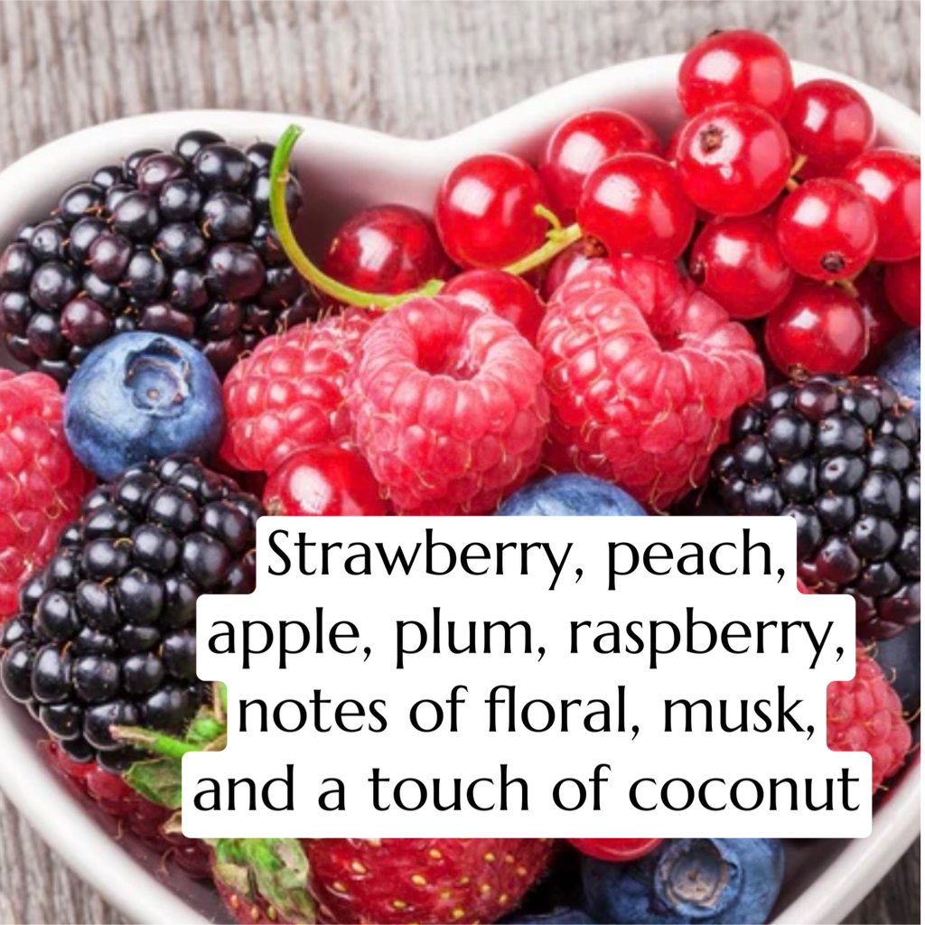 Assorted berries including strawberries, raspberries, and blueberries in a bowl with descriptive text overlay.
