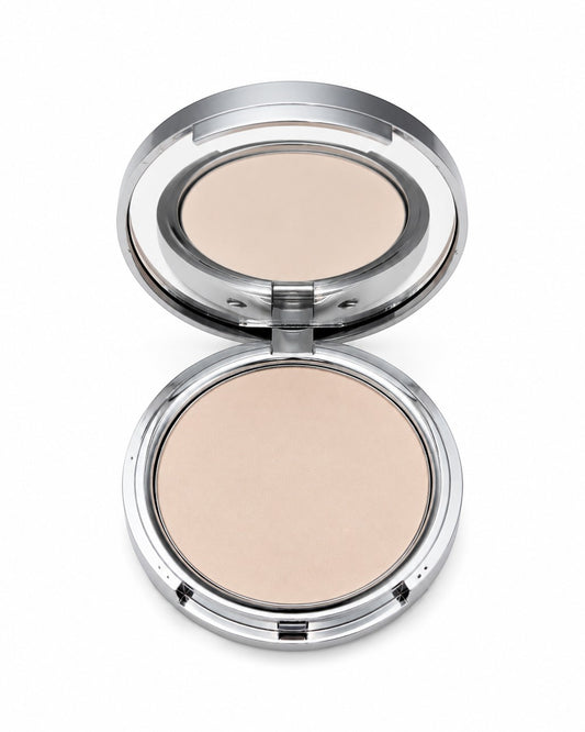 Compact powder in a silver case on a white background