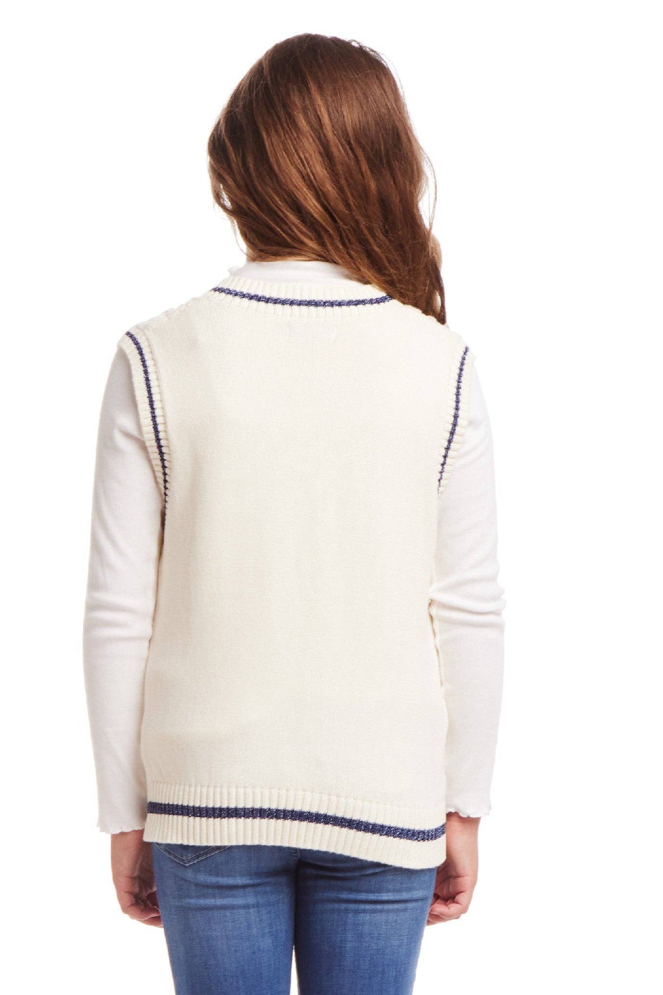 Woman wearing a cream-colored vest over a white shirt with blue trim on a white background
