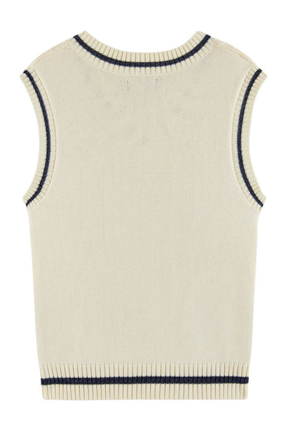 Beige sleeveless knit vest with navy trim on a white background