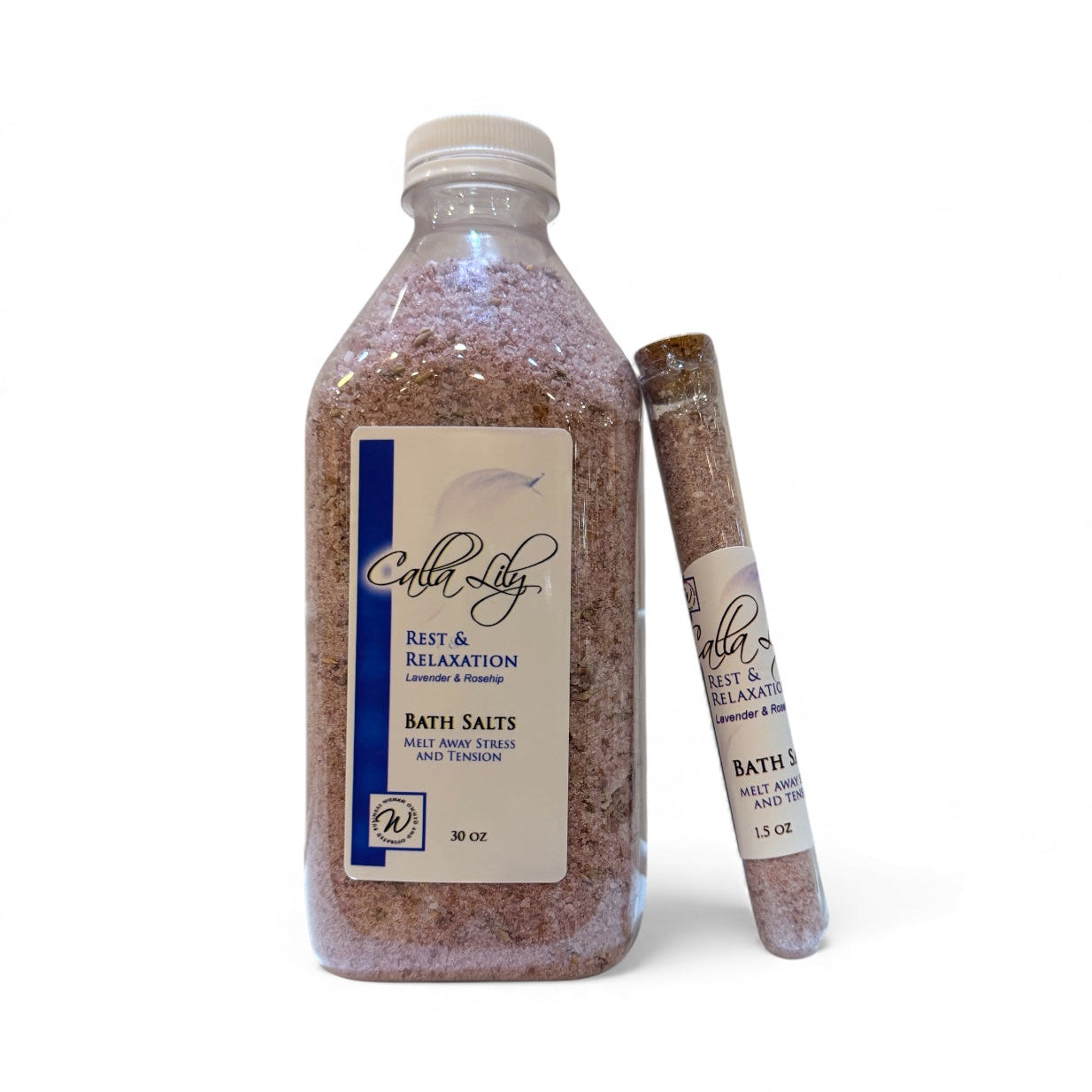 Bottle and stick of bath salts with a label on a white background