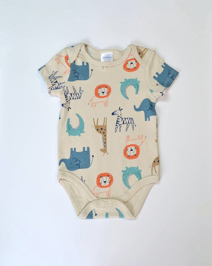 Beige baby onesie with animal patterns on a white background