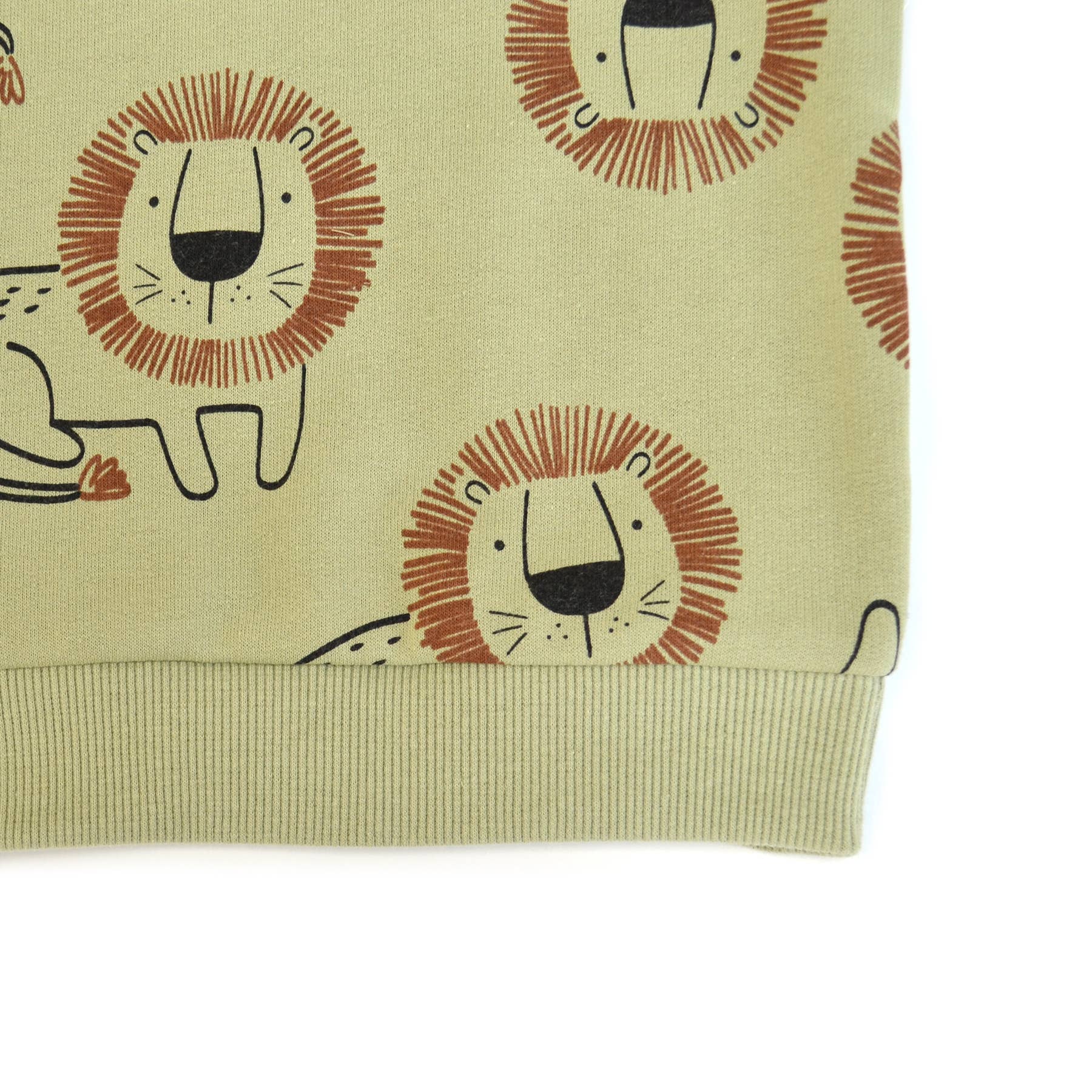 Fabric with lion pattern on a beige background