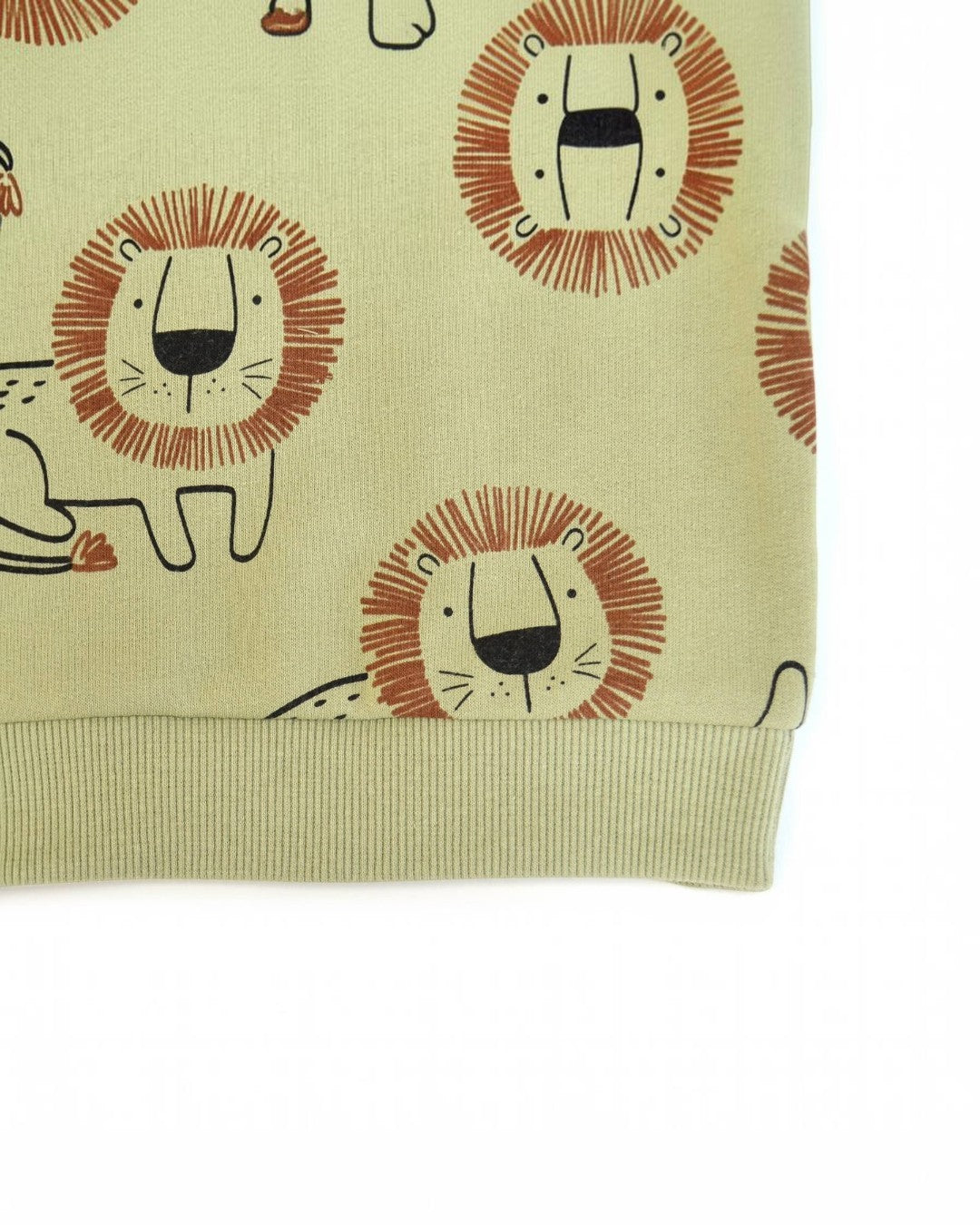 Fabric with lion pattern on a beige background