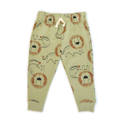 Beige children's pants with lion print on a white background