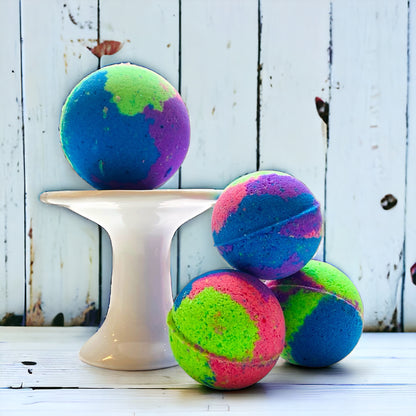 Colorful bath bombs on a white stand against a rustic wooden background