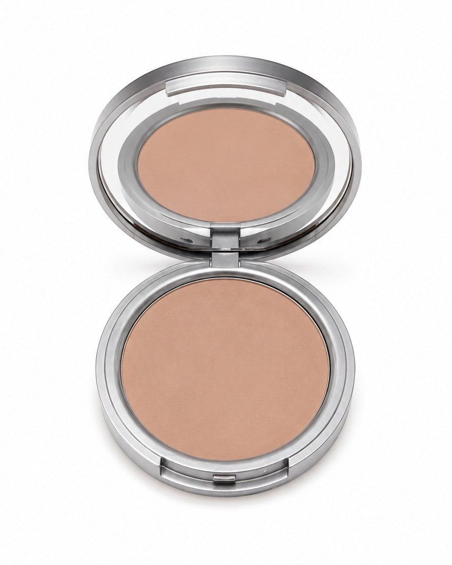 Compact powder in a silver case on a white background