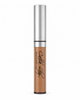 Concealer tube with silver top and brown body on a white background