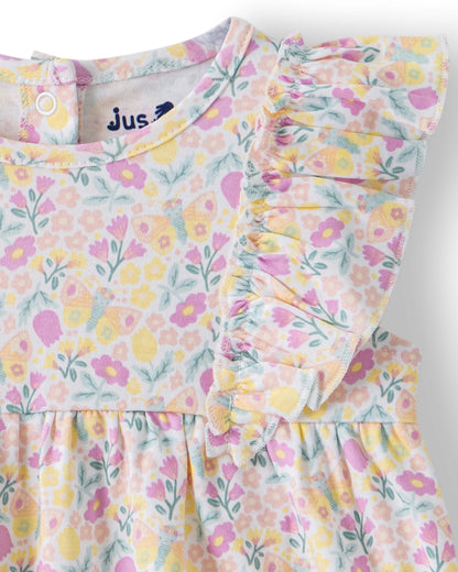 Floral dress with ruffled sleeves on a white background